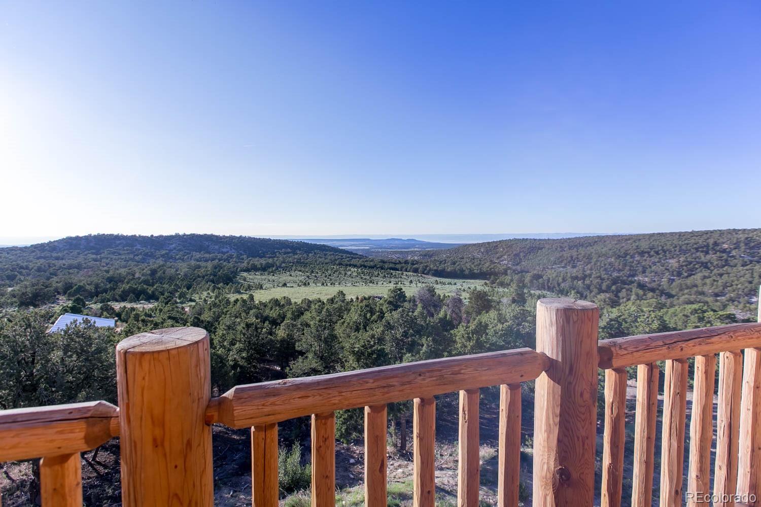 18342 Miller Canyon Ranch Road Glade Park, CO 81523 - Photo 5 of 38 a balcony with an outdoor space