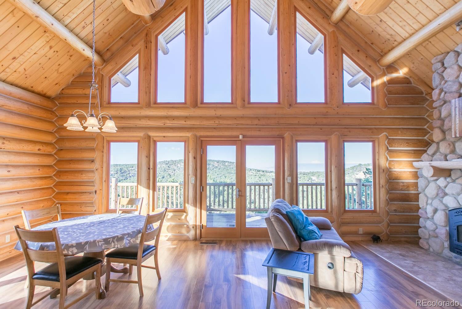 18342 Miller Canyon Ranch Road Glade Park, CO 81523 - Photo 7 of 38 a view of a patio with a table and chairs