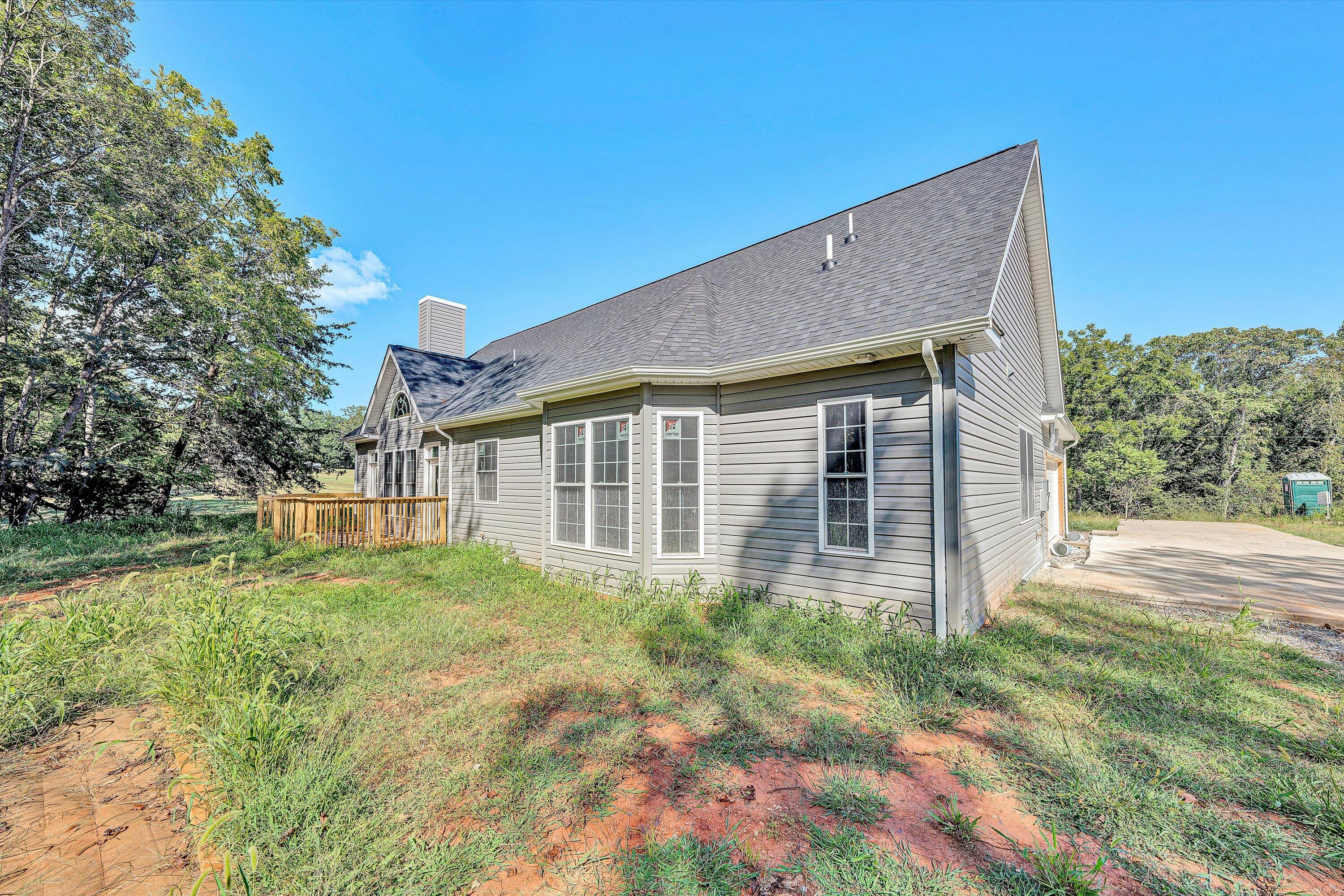 3769 Hales Ford Road Moneta, VA 24121 - Photo 23 of 26 a house view with a garden space
