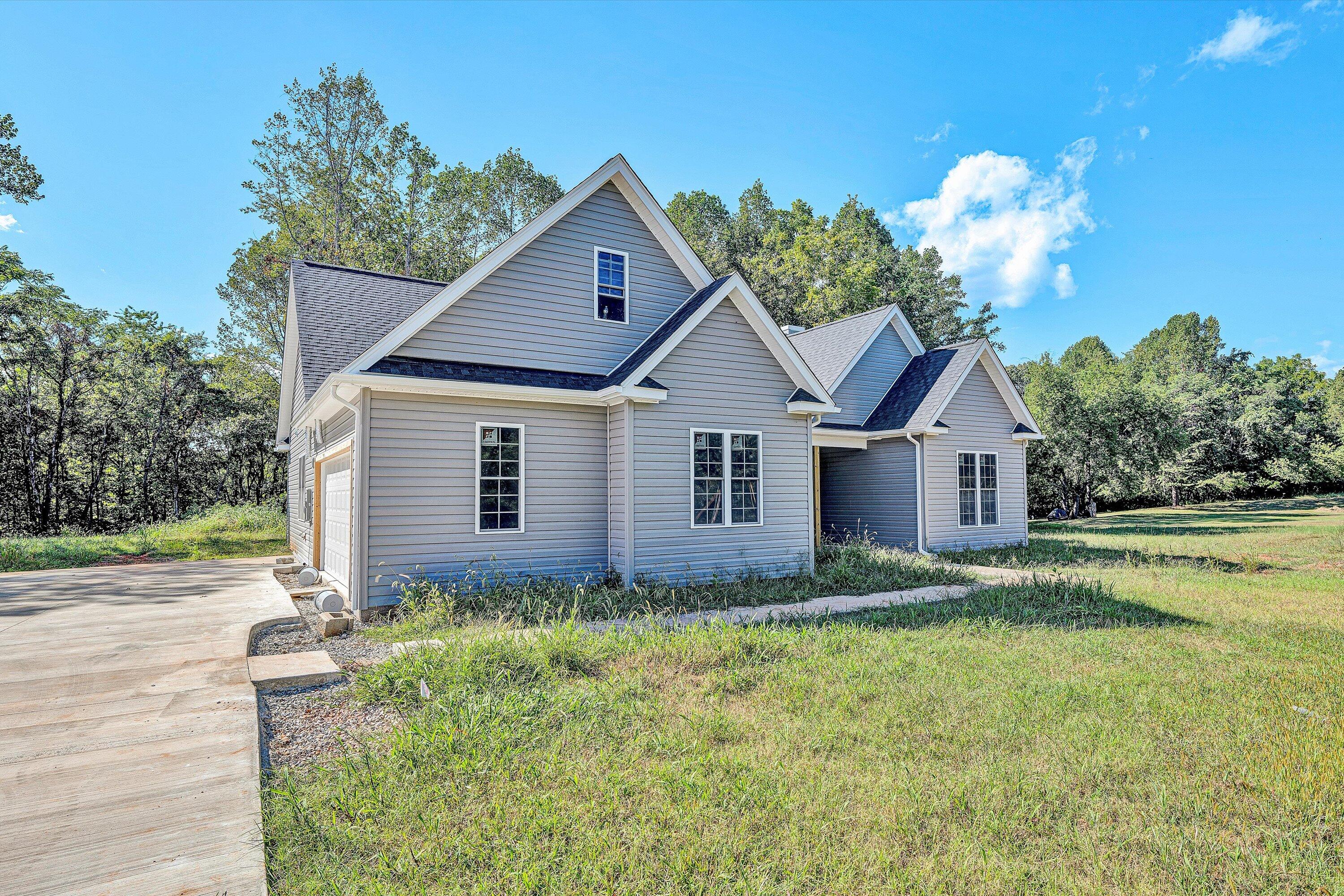 3769 Hales Ford Road Moneta, VA 24121 - Photo 3 of 26 a view of a house with a yard
