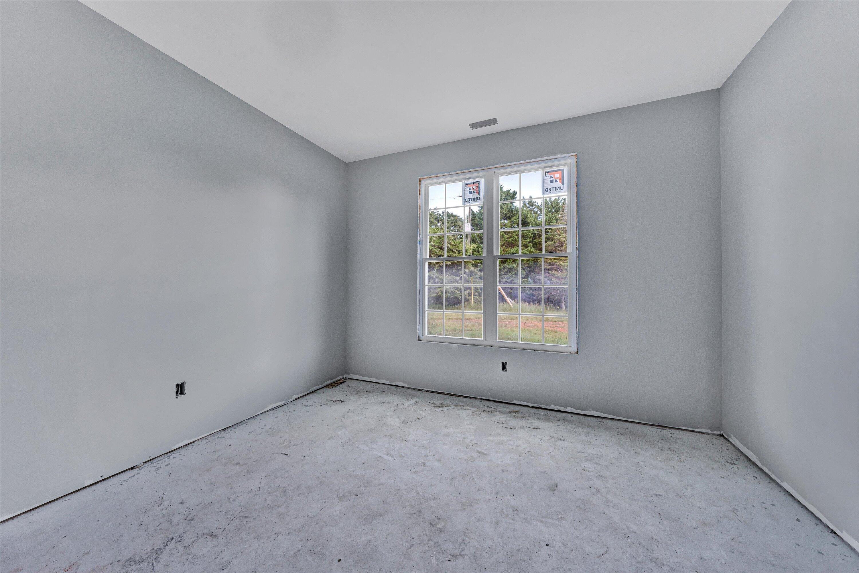 3769 Hales Ford Road Moneta, VA 24121 - Photo 7 of 26 a view of an empty room with a window