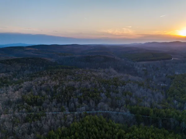 a view of mountains and valleys