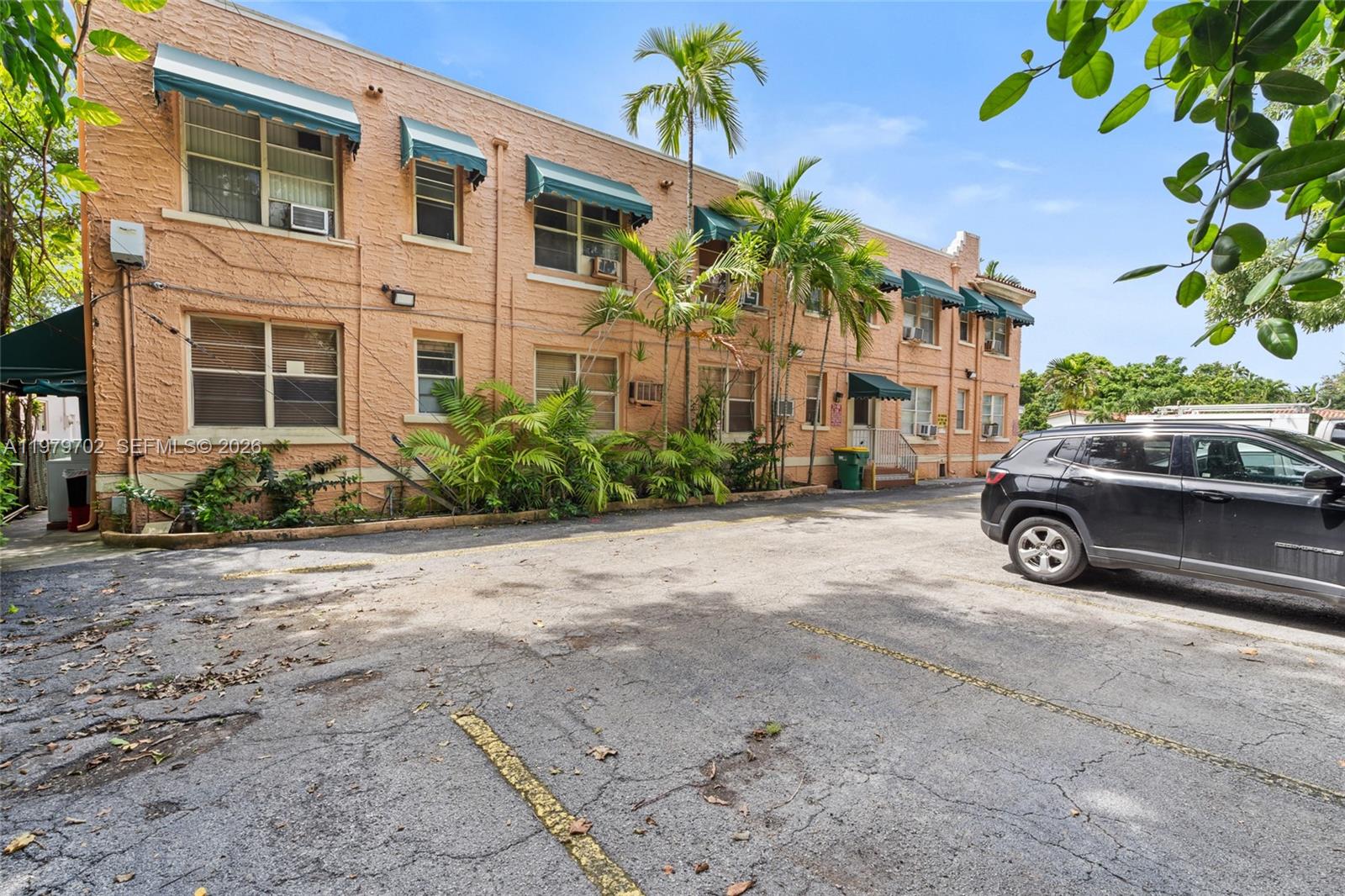 3409 South Le Jeune Road Coral Gables, FL 33134 - Photo 21 of 53 a car parked in front of a building