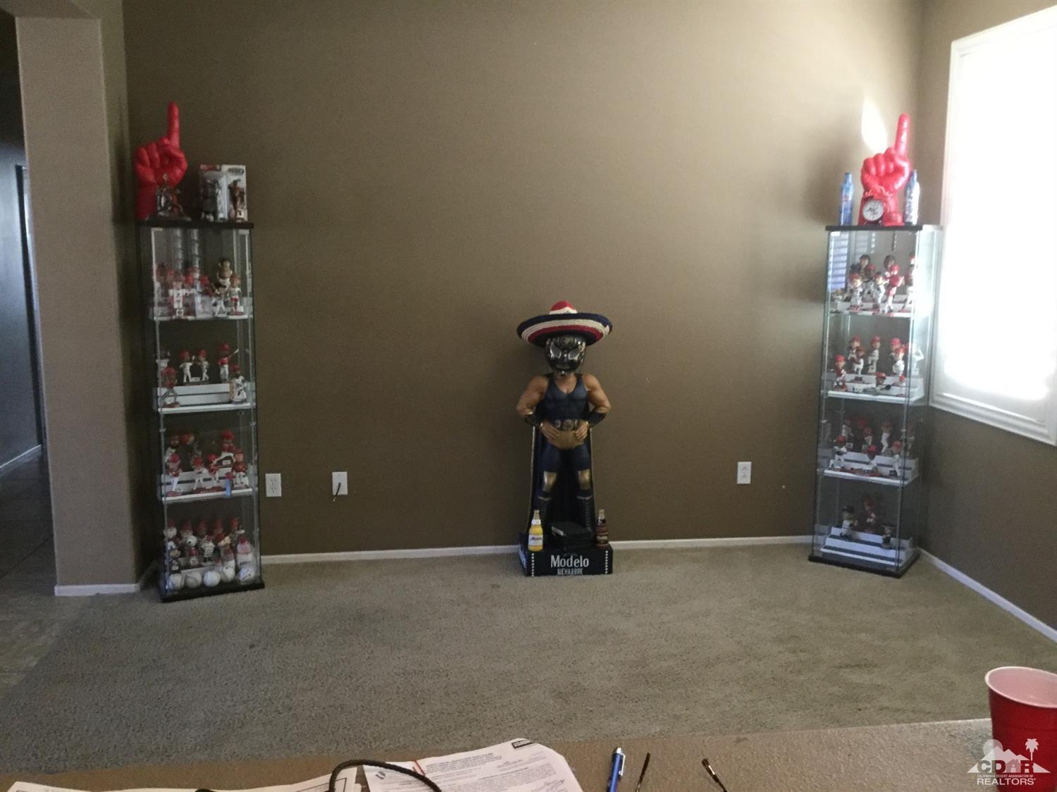 83316 Lone Star Road Indio, CA 92203 - Photo 13 of 43 a room with toys and potted plants