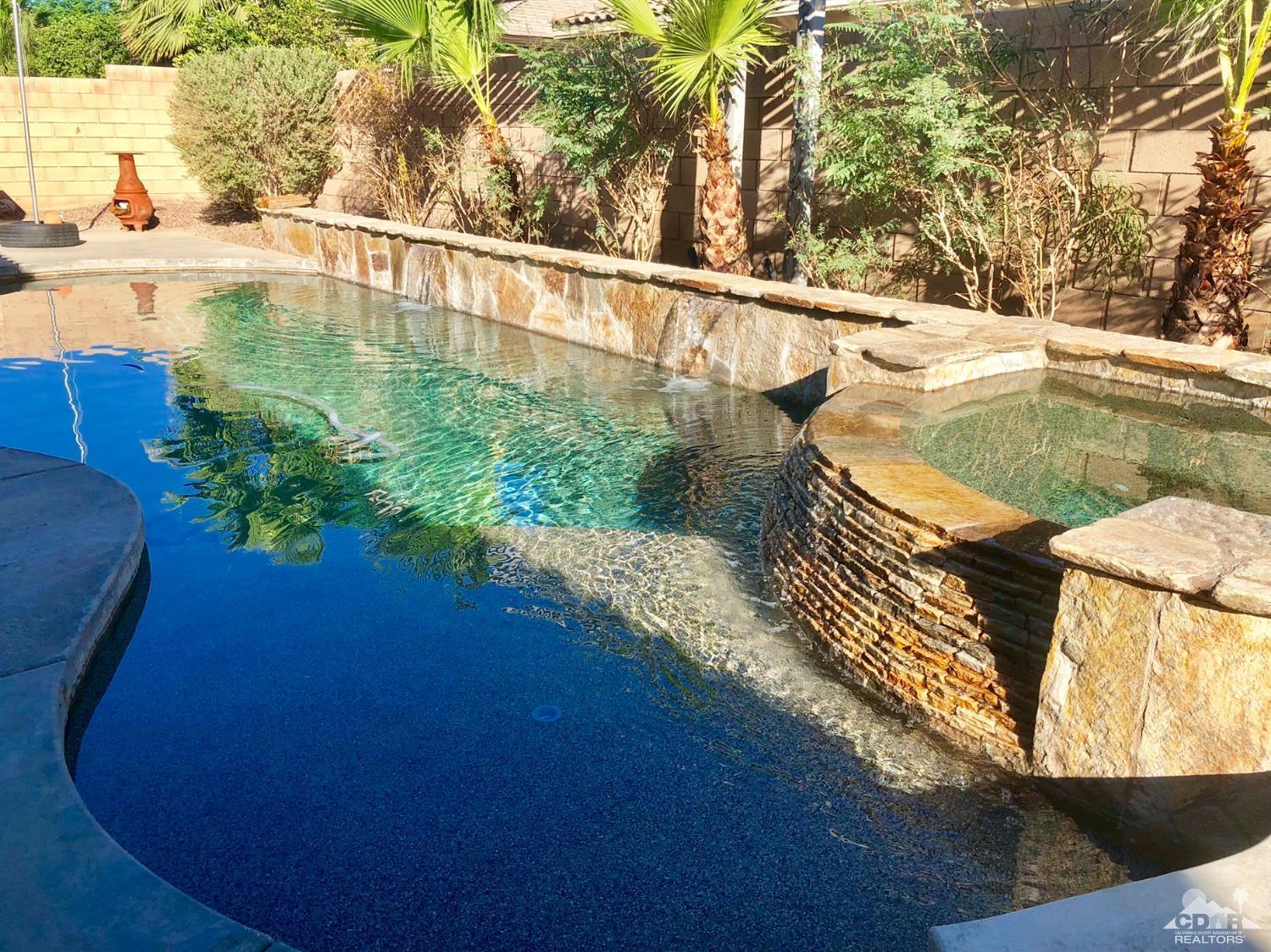 83316 Lone Star Road Indio, CA 92203 - Photo 29 of 43 a view of a lake from a balcony