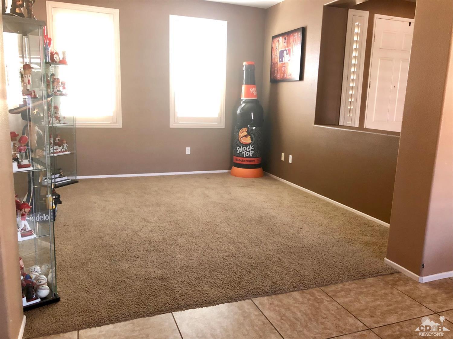 83316 Lone Star Road Indio, CA 92203 - Photo 30 of 43 an empty room with windows