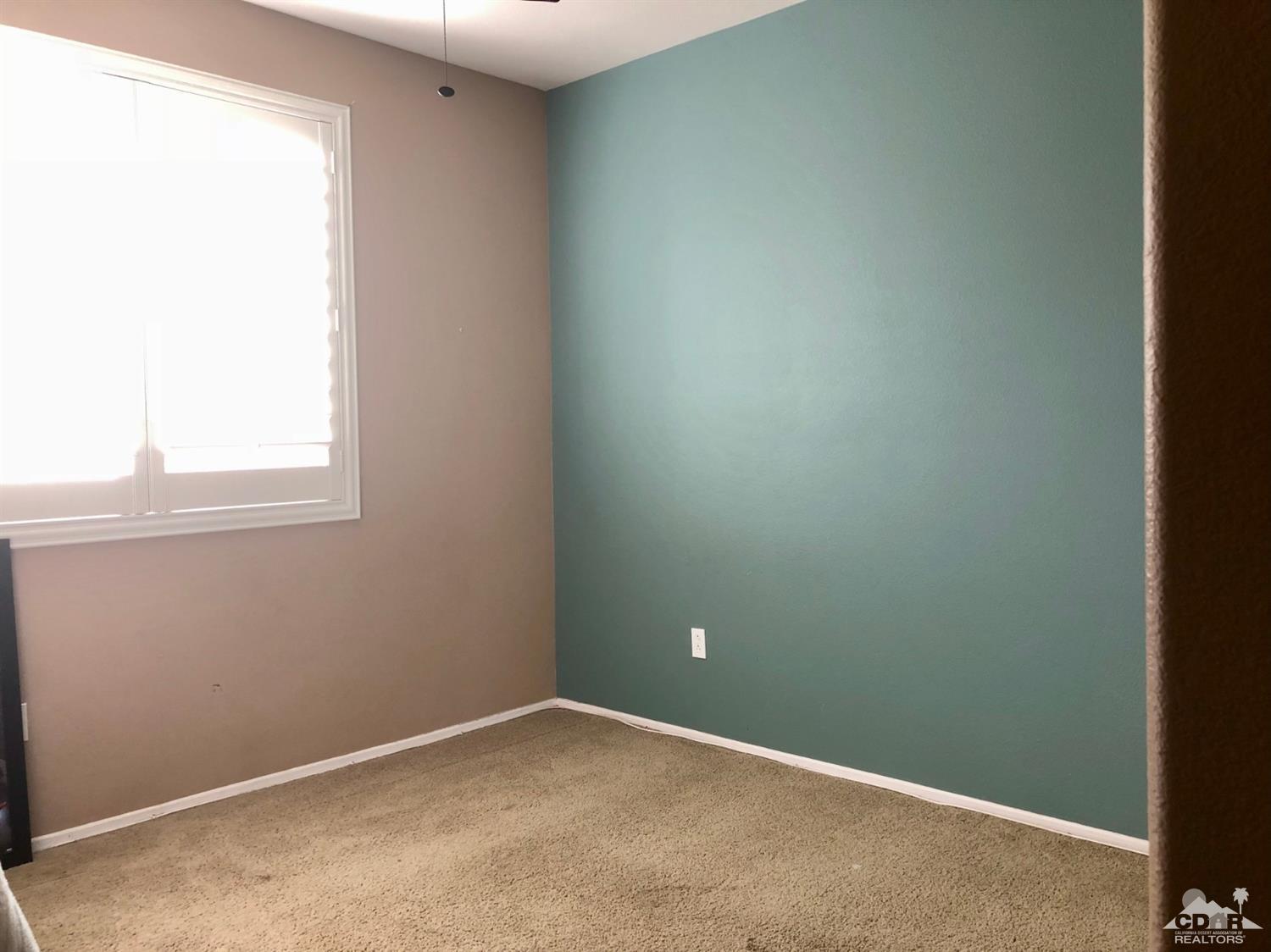 83316 Lone Star Road Indio, CA 92203 - Photo 33 of 43 an empty room with a window