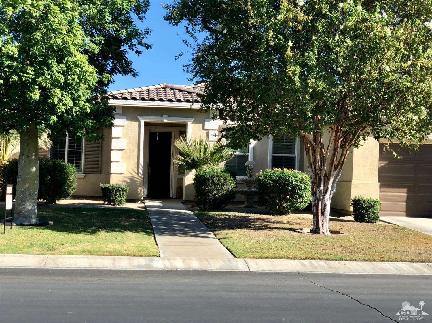 83316 Lone Star Road Indio, CA 92203 - Photo 39 of 43 a view of a house with a swimming pool