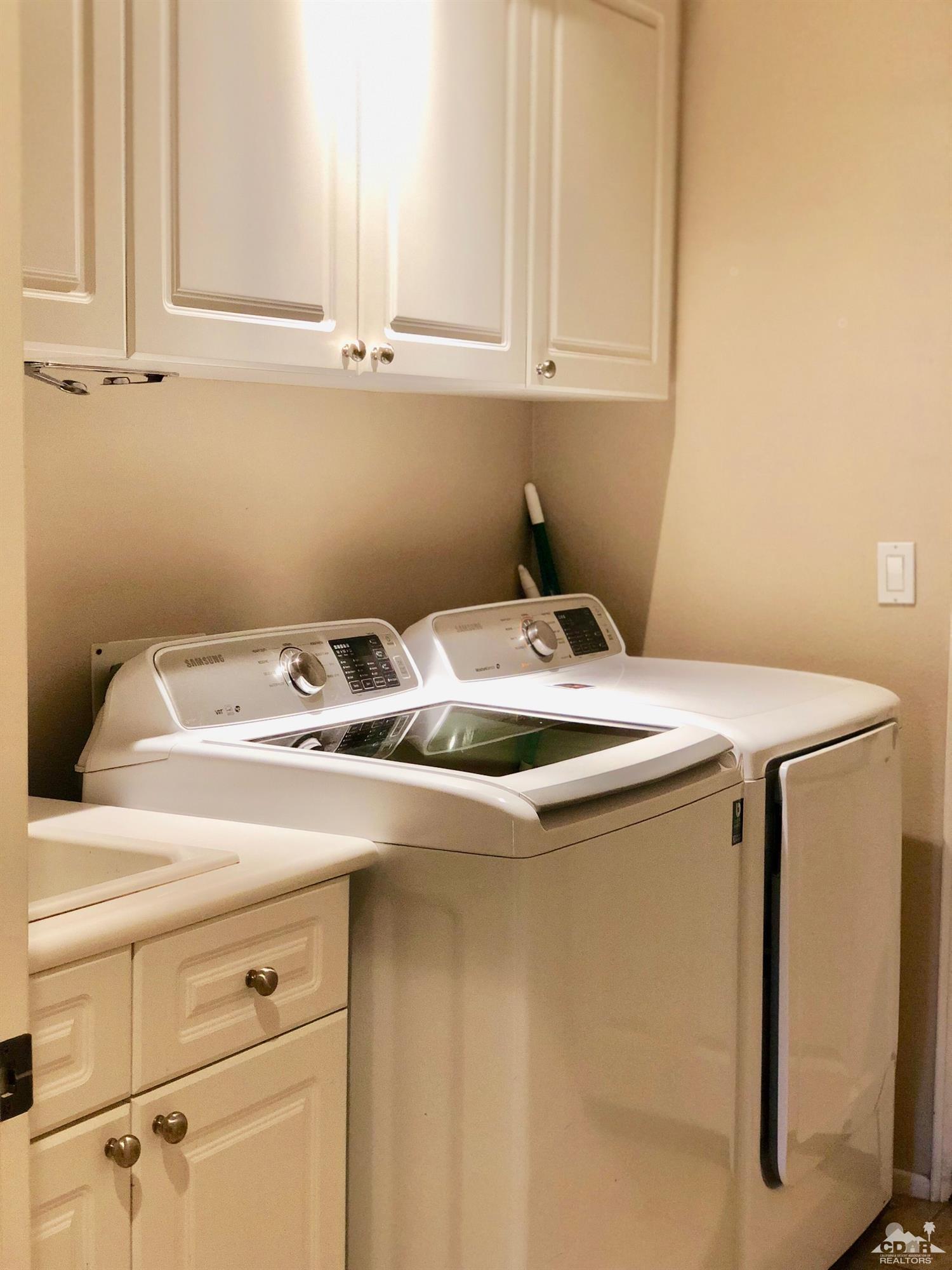 83316 Lone Star Road Indio, CA 92203 - Photo 43 of 43 a utility room with dryer and washer