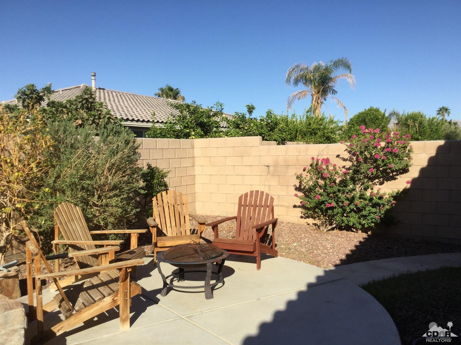 83316 Lone Star Road Indio, CA 92203 - Photo 8 of 43 a view of a lake with couches and city view