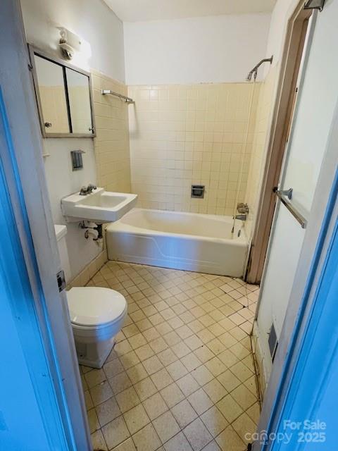 1421 Tyvola Road Charlotte, NC 28210 - Photo 13 of 23 a bathroom with a sink a toilet and shower