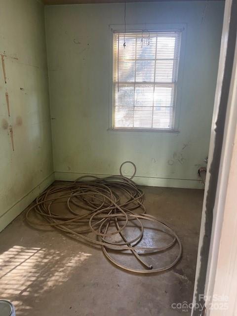 1421 Tyvola Road Charlotte, NC 28210 - Photo 20 of 23 a room with a water heater and a window