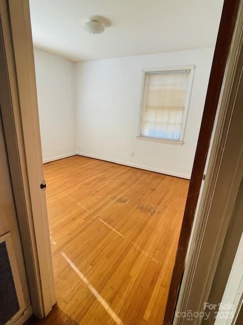 1421 Tyvola Road Charlotte, NC 28210 - Photo 21 of 23 a view of an empty room and a window