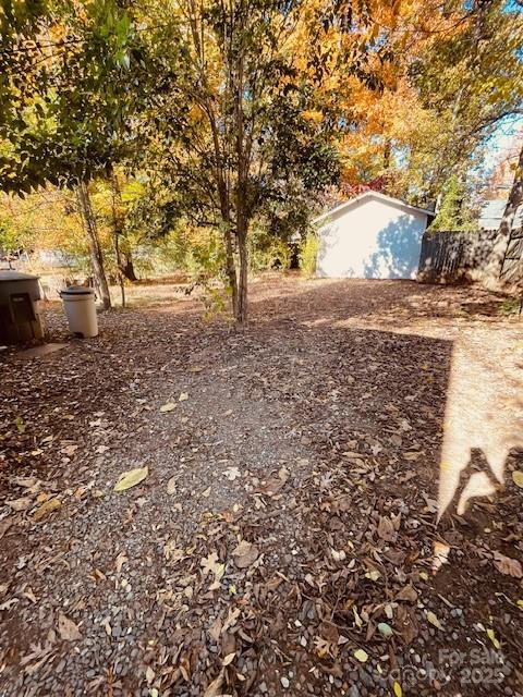 1421 Tyvola Road Charlotte, NC 28210 - Photo 3 of 23 a view of yard covered with trees