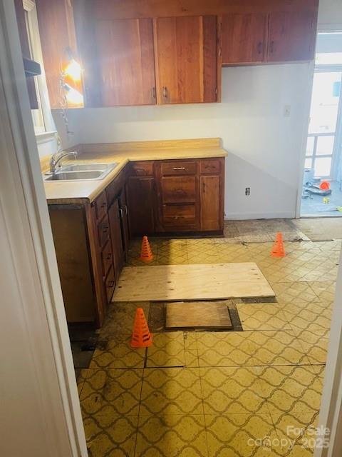 1421 Tyvola Road Charlotte, NC 28210 - Photo 7 of 23 a bathroom with a sink and a mirror
