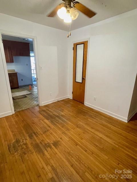 1421 Tyvola Road Charlotte, NC 28210 - Photo 9 of 23 a view of empty room with wooden floor