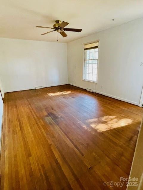 1421 Tyvola Road Charlotte, NC 28210 - Photo 10 of 23 wooden floor in an empty room