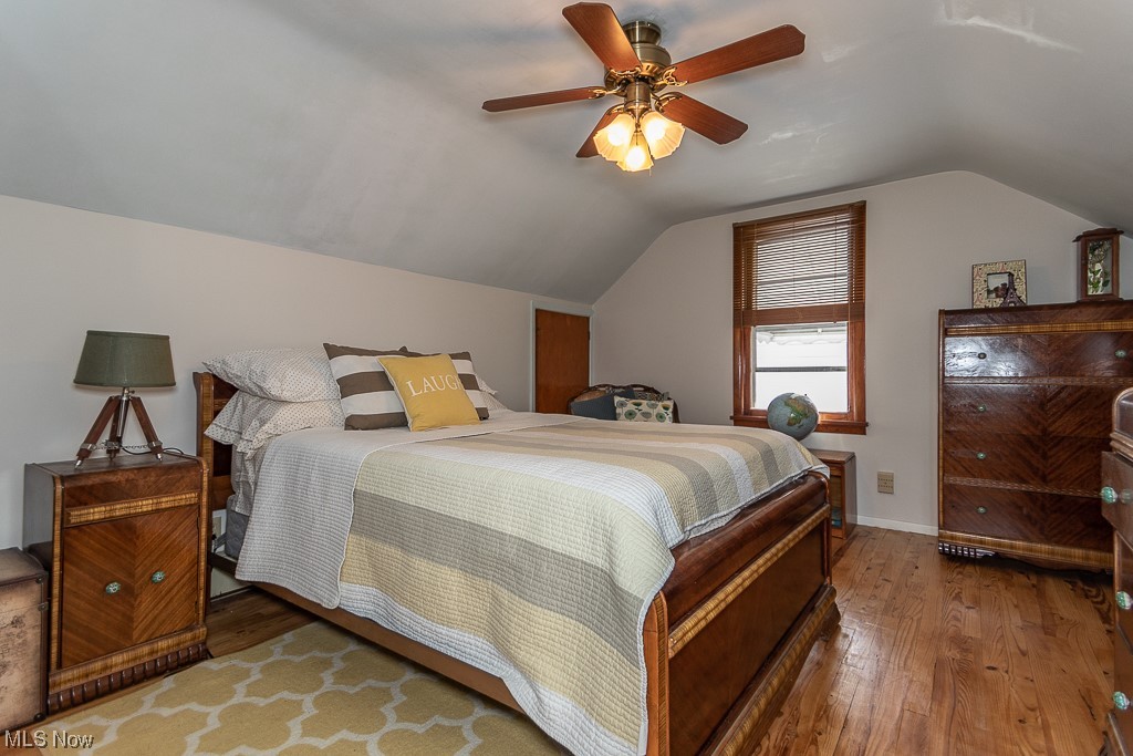 1318 Sunset Road Cleveland, OH 44124 - Photo 21 of 29 Owners suite featuring hardwood floors. ceiling fan, and vaulted ceiling