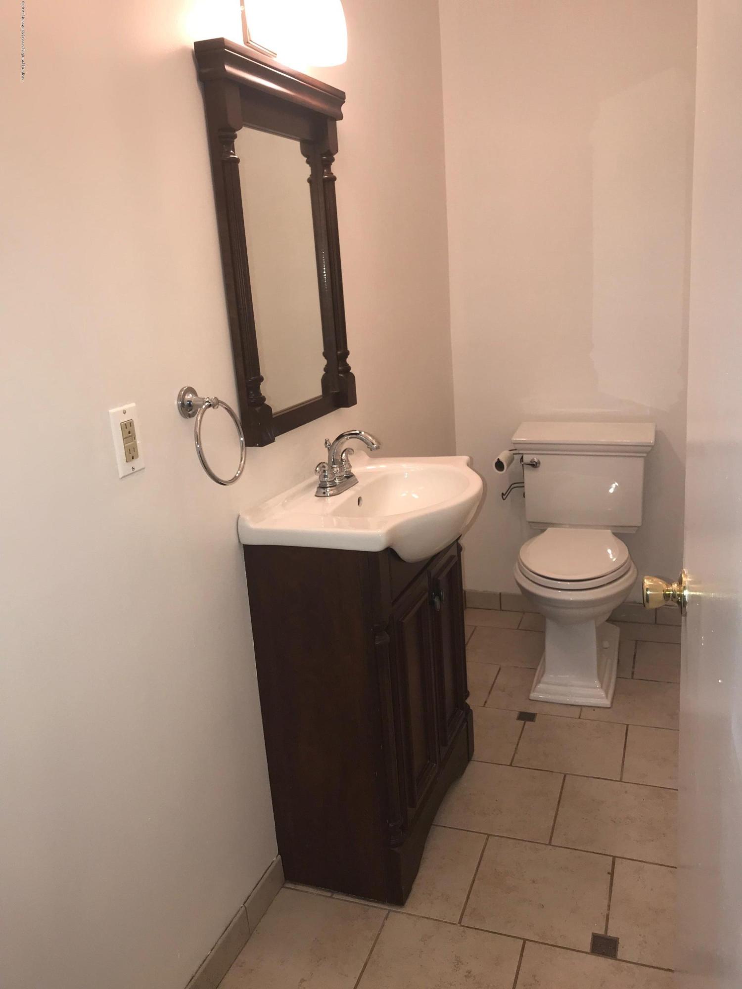 509 Harding Road, Unit 6 Freehold, NJ 07728 - Photo 8 of 15 a bathroom with a sink and a toilet