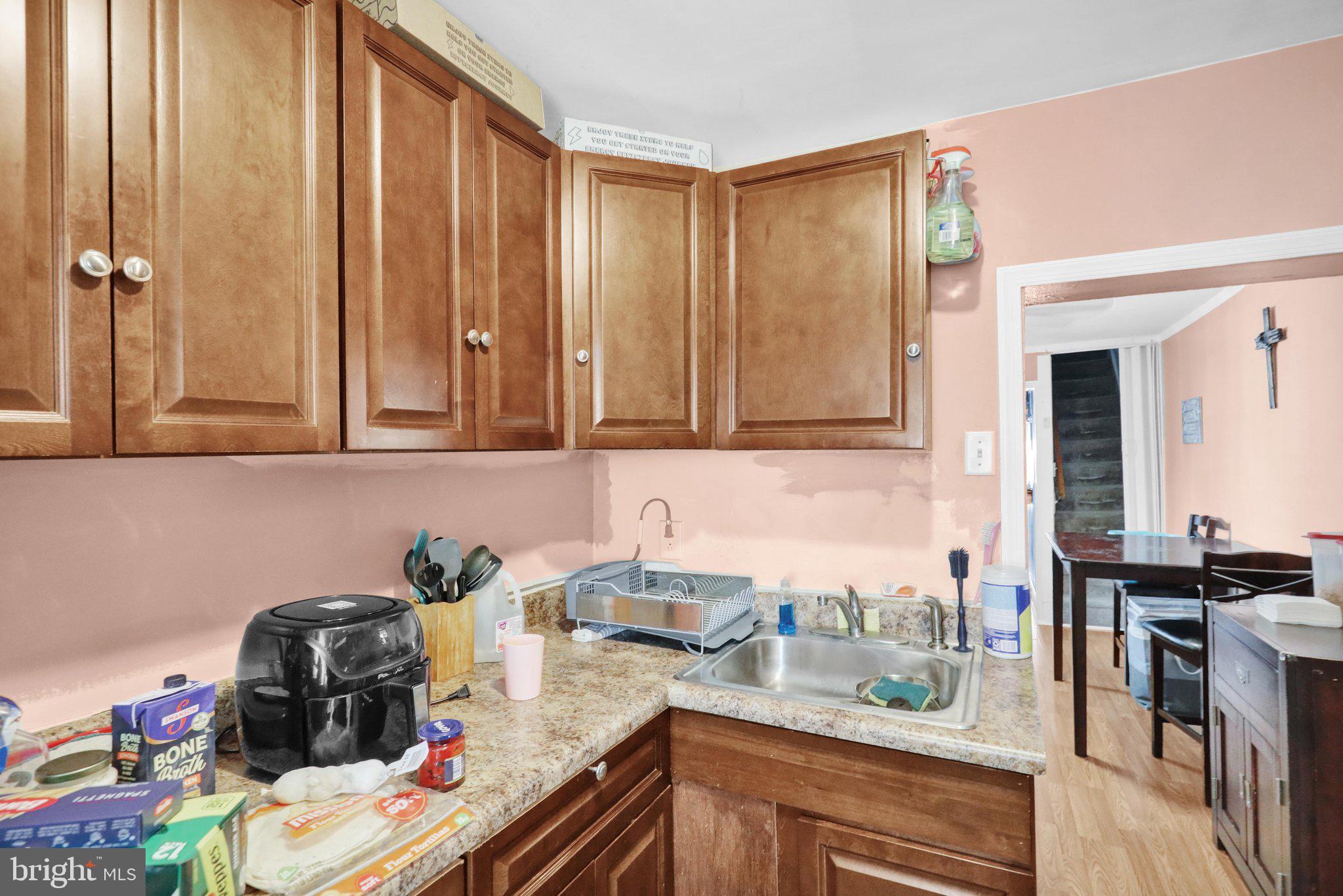 1122 Buttonwood Street Reading, PA 19604 - Photo 9 of 18 a kitchen with a sink and cabinets
