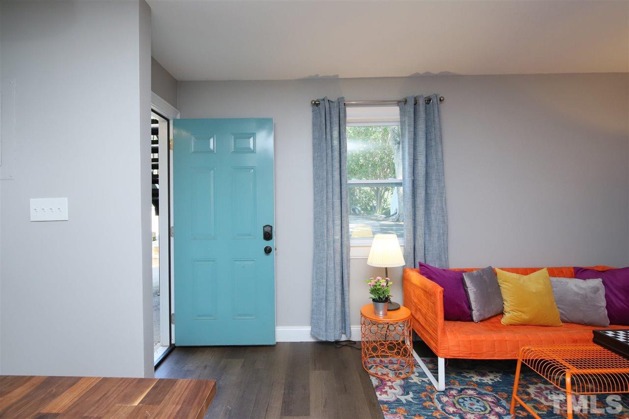 815 Clay Street Raleigh, NC 27605 - Photo 11 of 30 a living room with furniture and a window