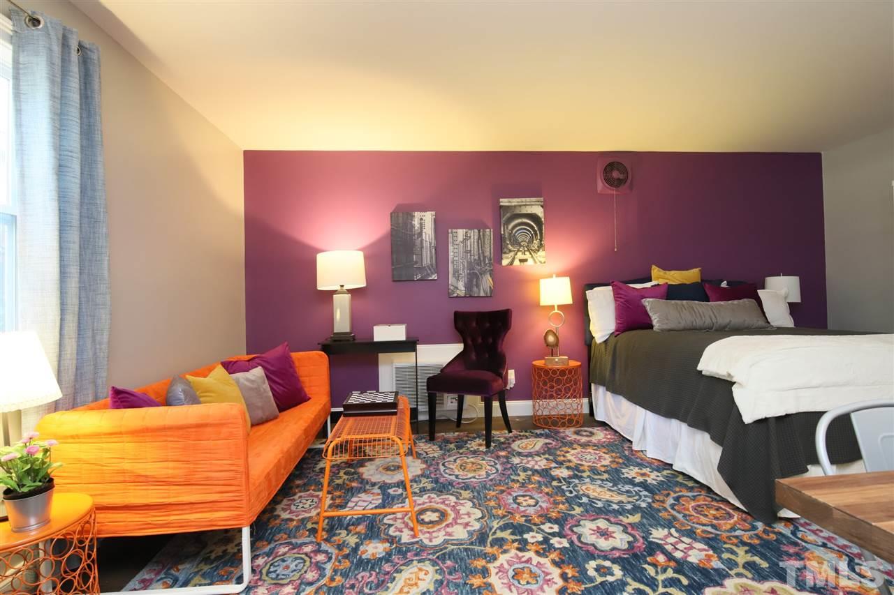 815 Clay Street Raleigh, NC 27605 - Photo 12 of 30 a living room with furniture and a couch