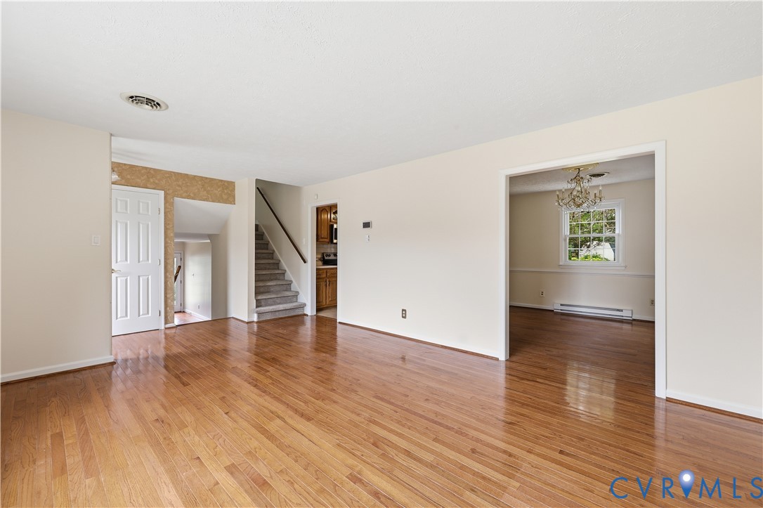 22925 River Road Petersburg, VA 23803 - Photo 15 of 27 Hardwood flooring spanning the main living area