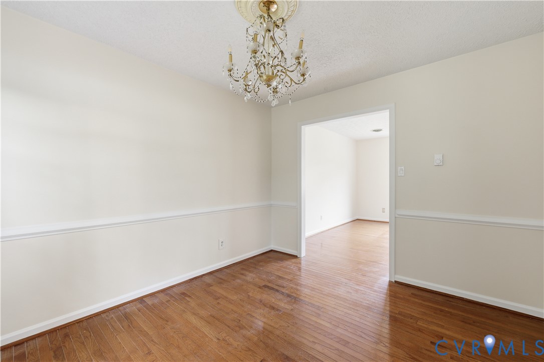 22925 River Road Petersburg, VA 23803 - Photo 17 of 27 Room featuring wood-finish flooring, white baseboa