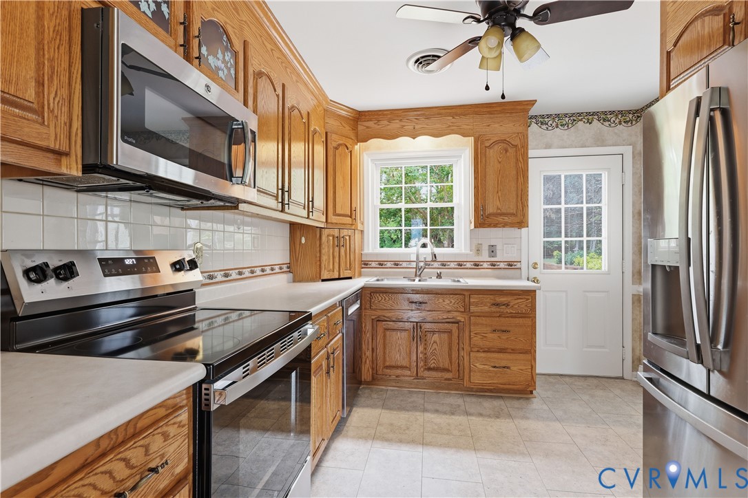 22925 River Road Petersburg, VA 23803 - Photo 19 of 27 Well-appointed kitchen featuring wood cabinetry, w