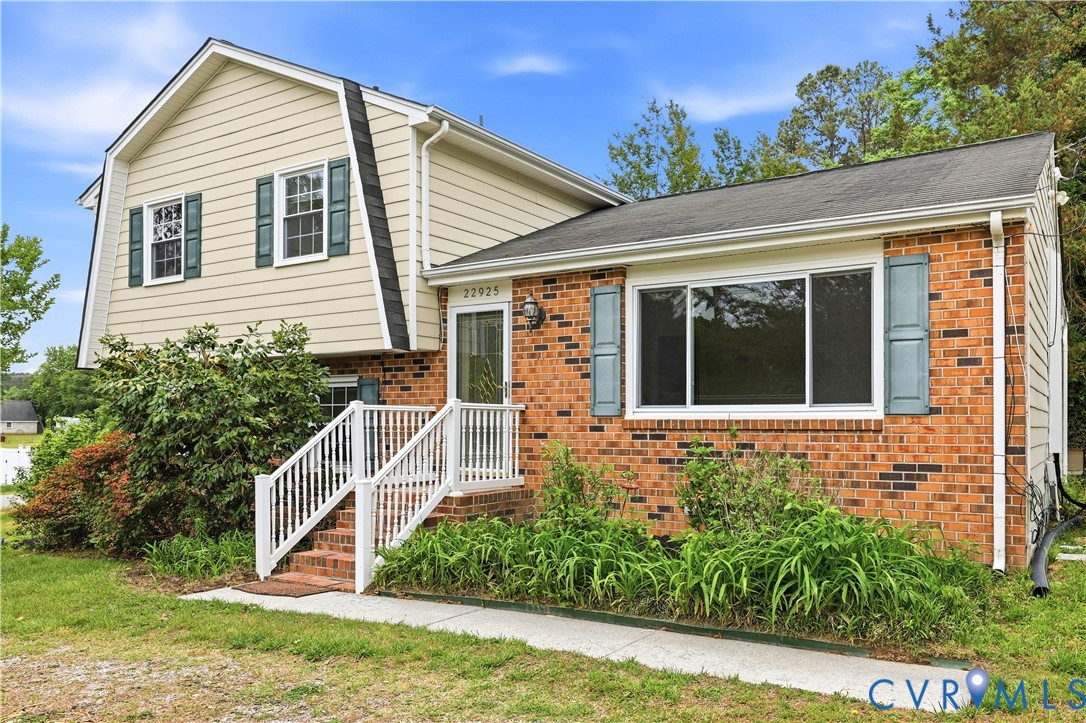 22925 River Road Petersburg, VA 23803 - Photo 2 of 27 Brick and siding exterior featuring an elevated en