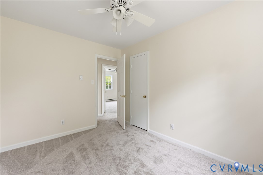 22925 River Road Petersburg, VA 23803 - Photo 21 of 27 Neutral-toned walls complement the light gray carp