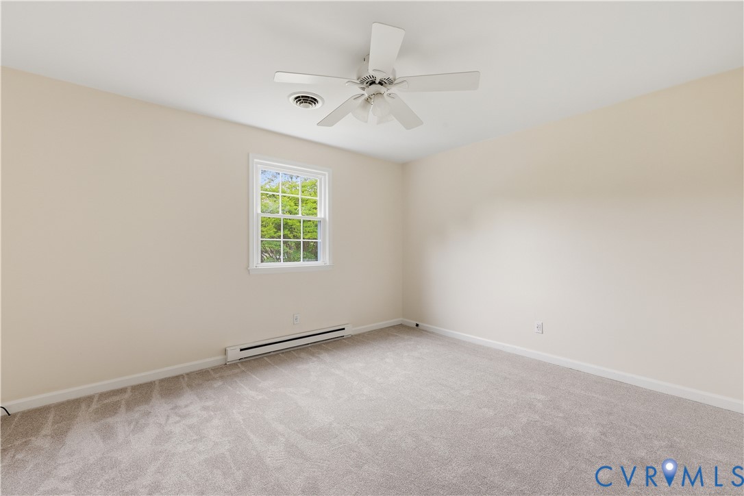 22925 River Road Petersburg, VA 23803 - Photo 24 of 27 Neutral-toned room featuring light beige walls and