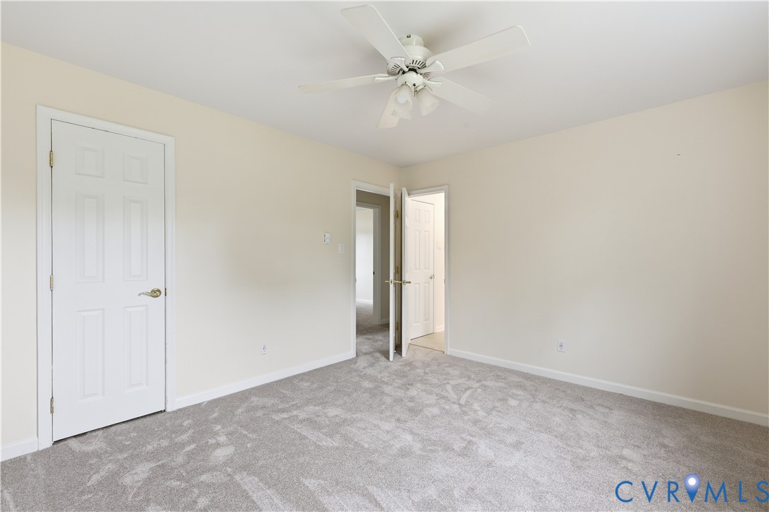 22925 River Road Petersburg, VA 23803 - Photo 25 of 27 Carpeted room with neutral wall tones and a ceilin