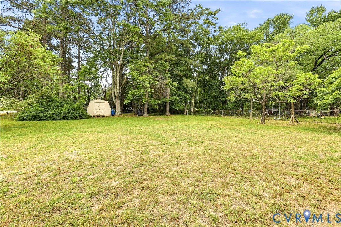 22925 River Road Petersburg, VA 23803 - Photo 4 of 27 Expansive grassy yard area featuring mature trees