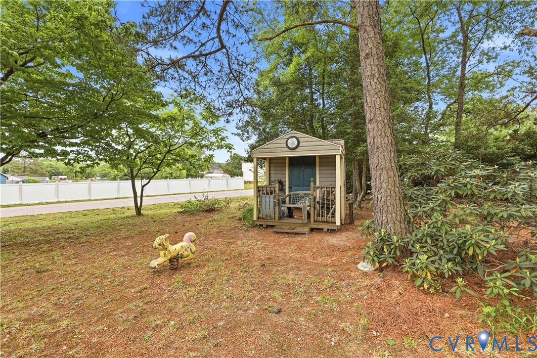 22925 River Road Petersburg, VA 23803 - Photo 5 of 27 Outdoor storage shed with light gray siding and a