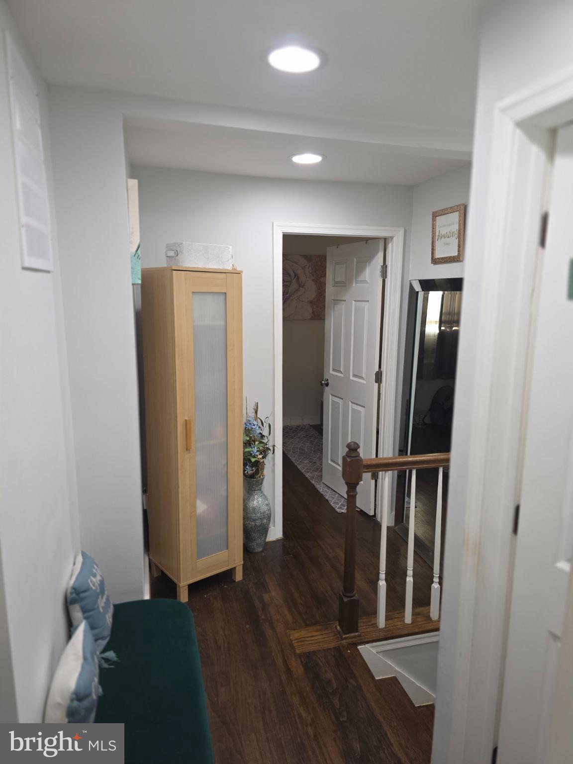 1808 Swansea Road Baltimore, MD 21239 - Photo 17 of 24 a view of hallway with wooden floor