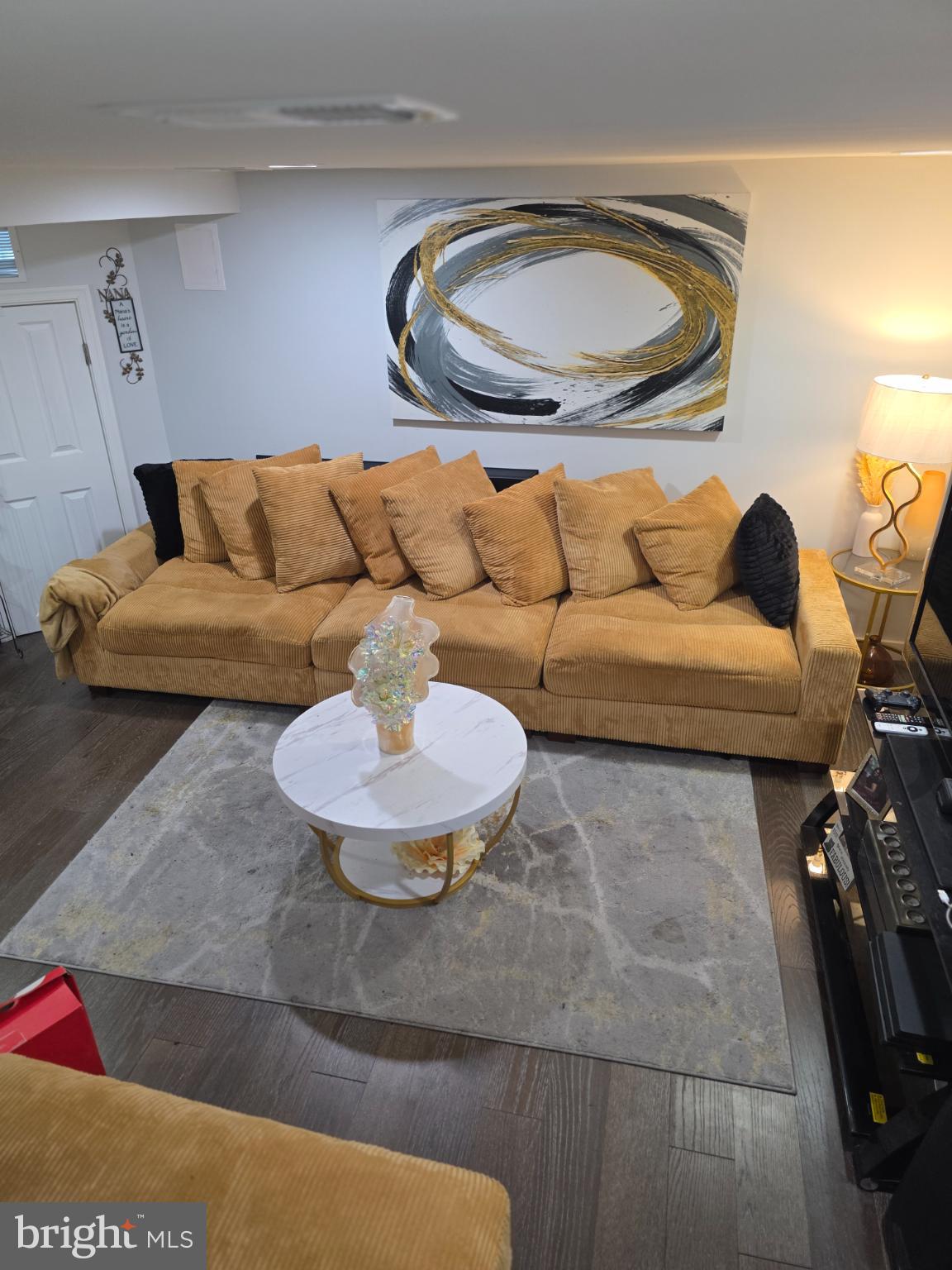 1808 Swansea Road Baltimore, MD 21239 - Photo 19 of 24 a living room with furniture and a rug