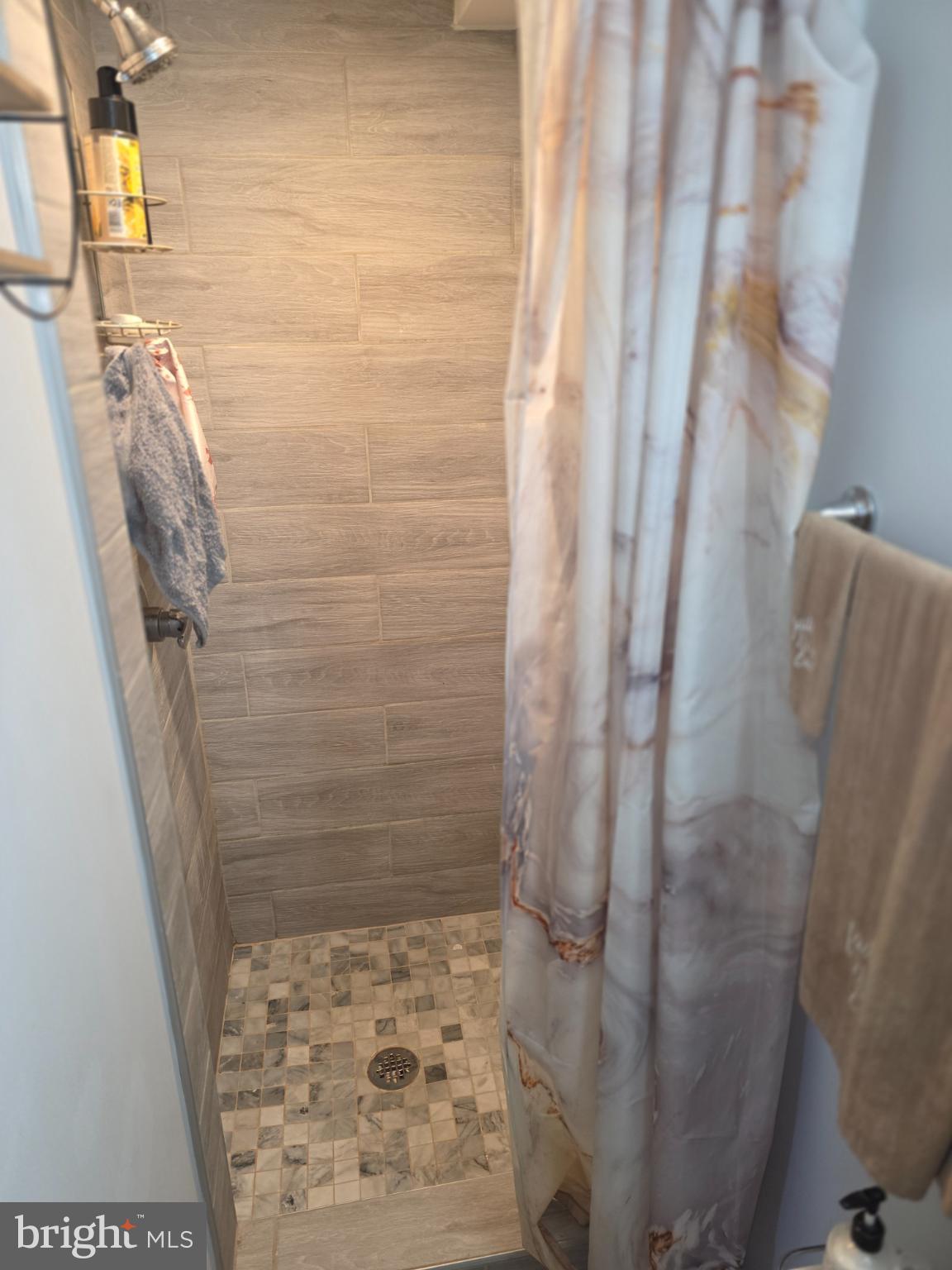 1808 Swansea Road Baltimore, MD 21239 - Photo 23 of 24 a bathroom with a shower