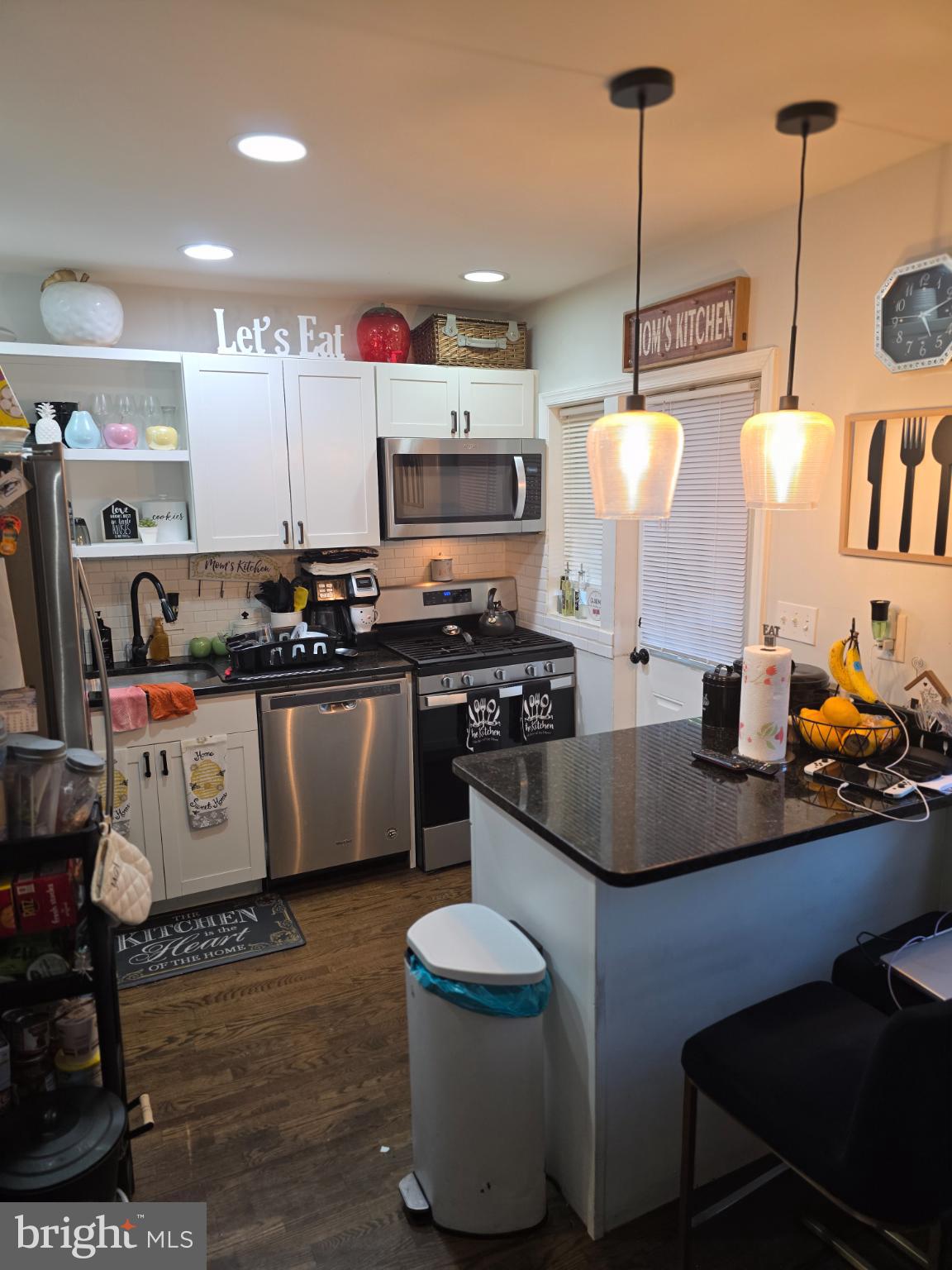 1808 Swansea Road Baltimore, MD 21239 - Photo 6 of 24 a kitchen with stainless steel appliances granite countertop a stove a sink and a refrigerator