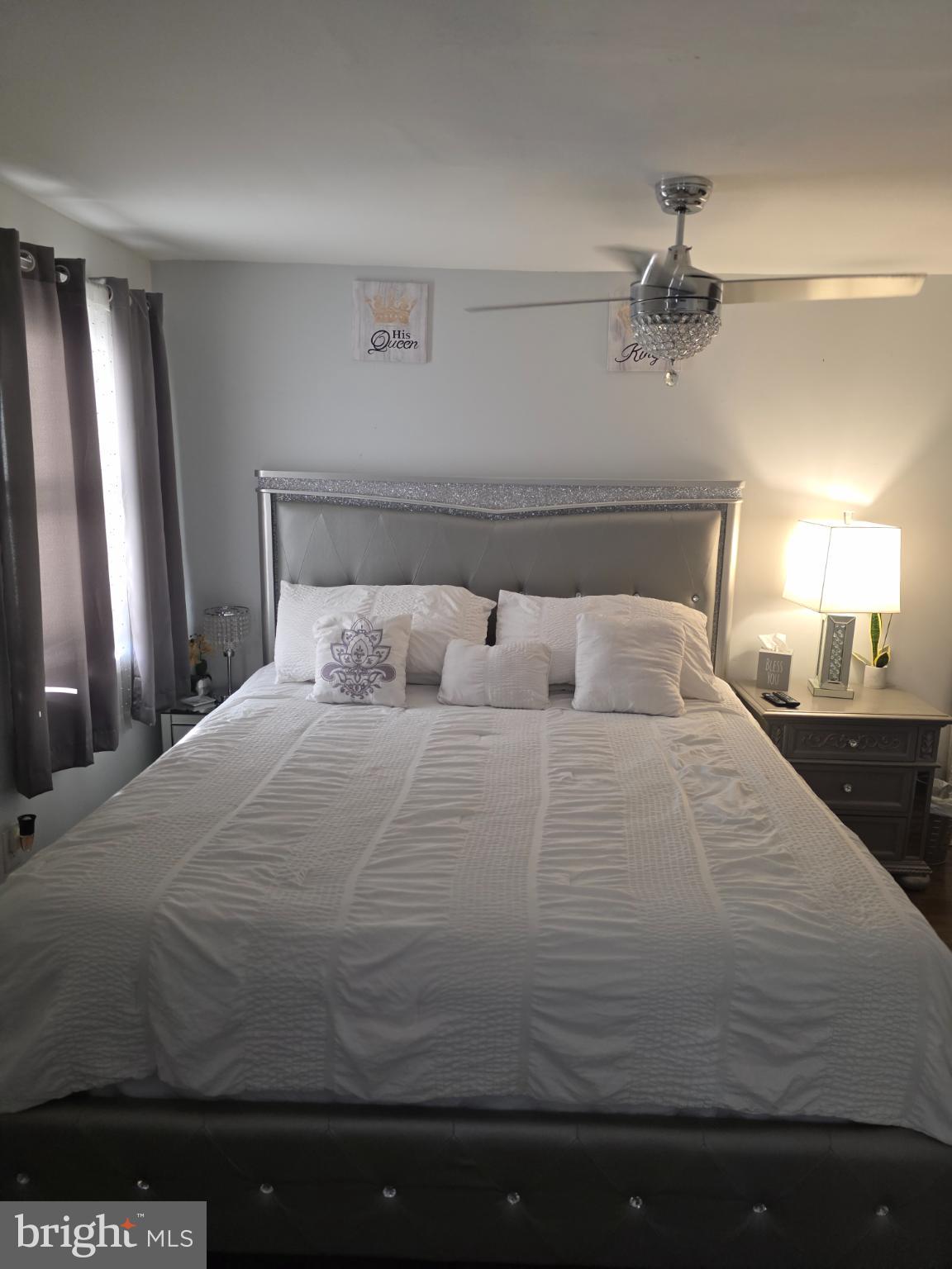 1808 Swansea Road Baltimore, MD 21239 - Photo 9 of 24 a bedroom with a bed and mirror