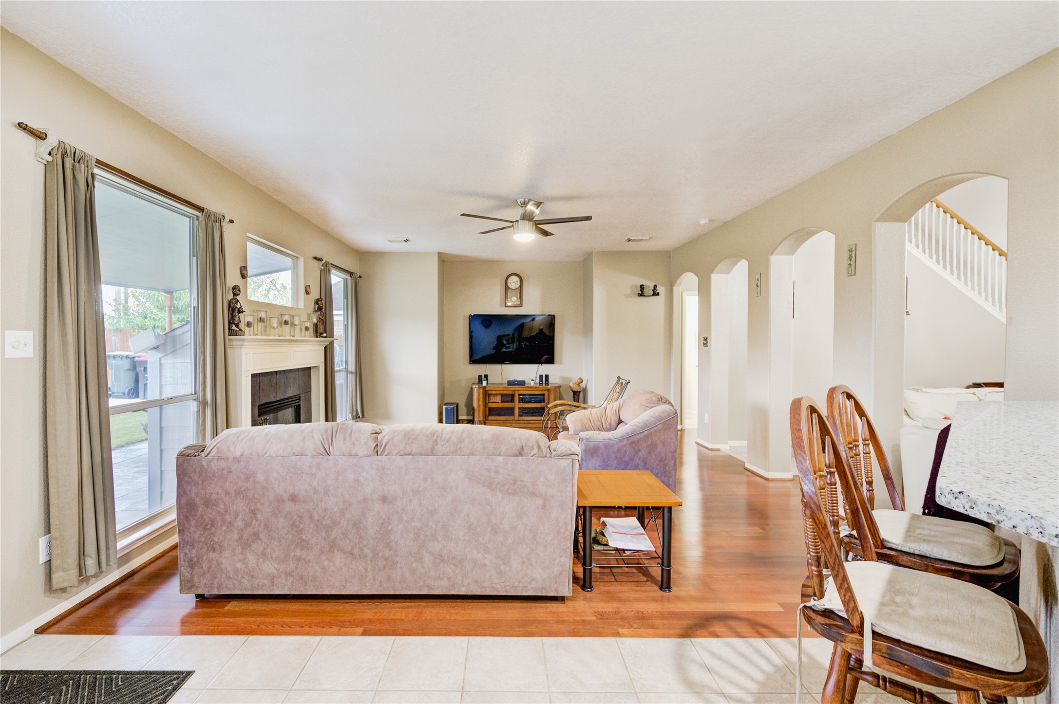 16730 Spring Barker Drive Cypress, TX 77429 - Photo 10 of 50 a living room with furniture and a flat screen tv