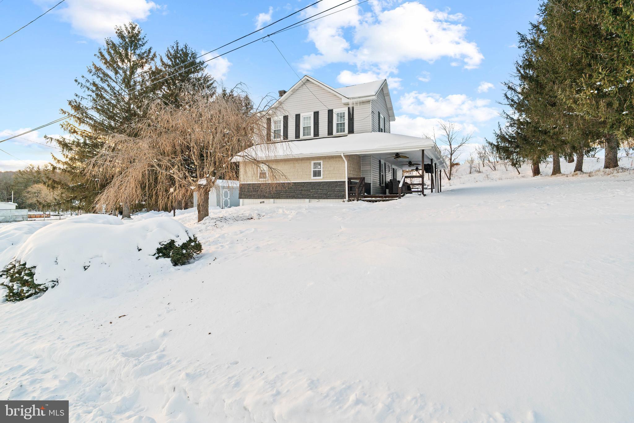 197 Ridge Street Smokerun, PA 16681 - Photo 46 of 47 a view of a house with a yard