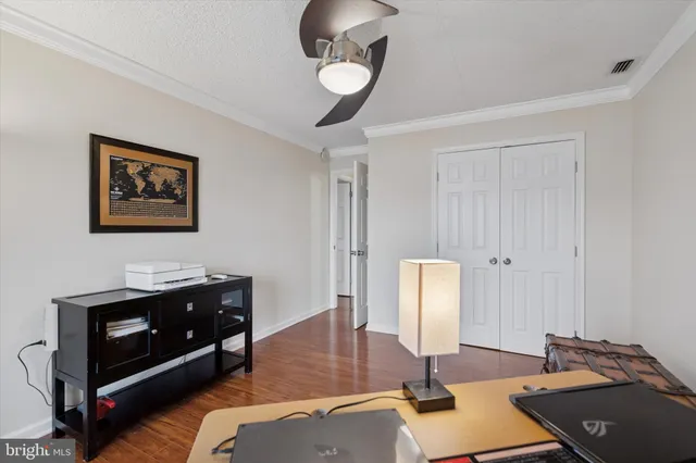 a workspace with furniture and window