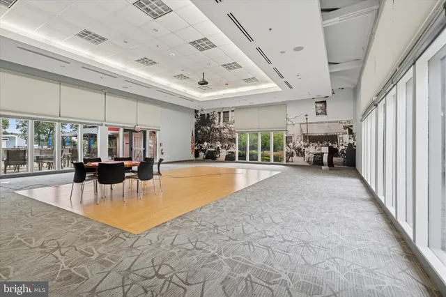a view of a living room and dining room