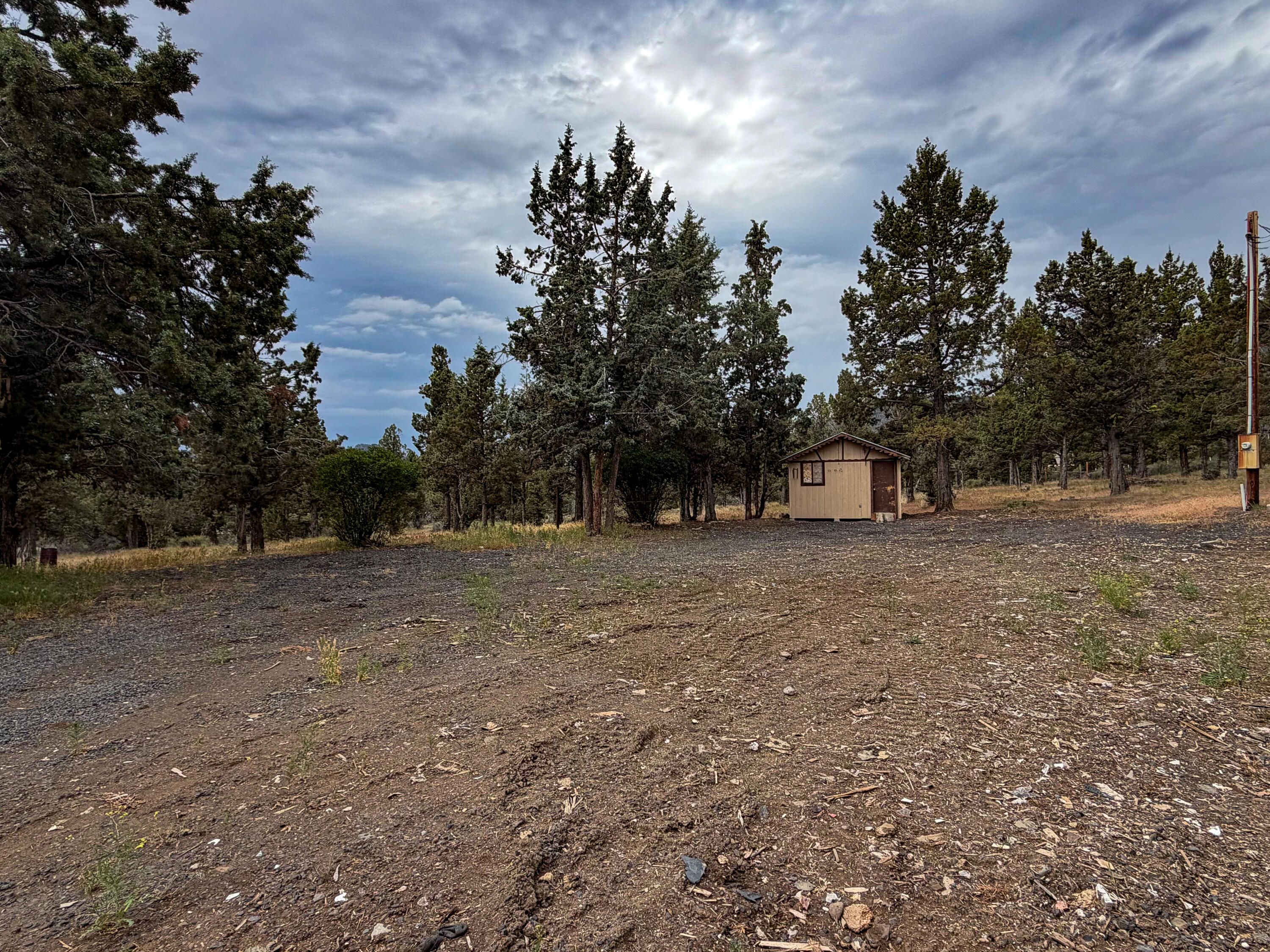 14375 Southeast Juniper Canyon Road Prineville, OR 97754 - Photo 1 of 10 a view of outdoor space with trees all around
