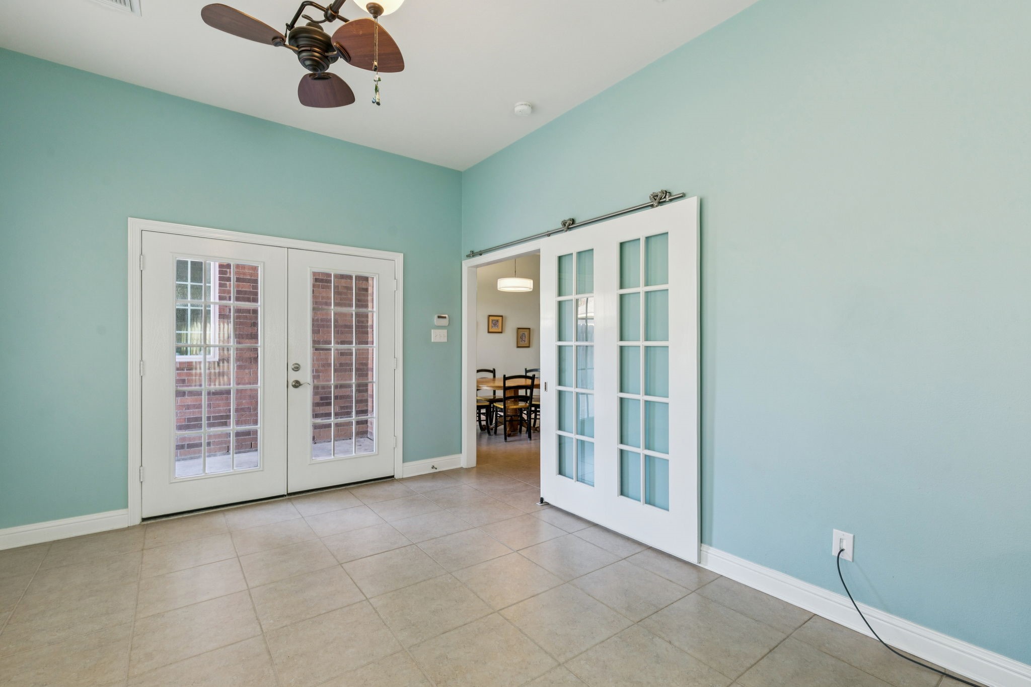 2809 Cedar Ridge Trail Friendswood, TX 77546 - Photo 15 of 33 SUN ROOM WITH GLASS BARN DOOR AND FRENCH DOORS TO OUTSIDE