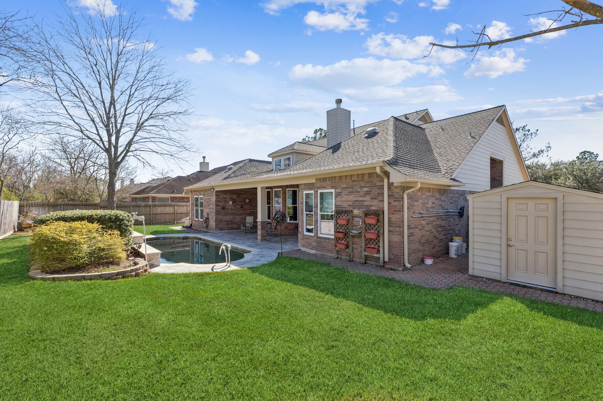 2809 Cedar Ridge Trail Friendswood, TX 77546 - Photo 27 of 33 LOTS OF YARD SPACE, HUGE STPAGE SHED, POOL AND BACK OF HOME