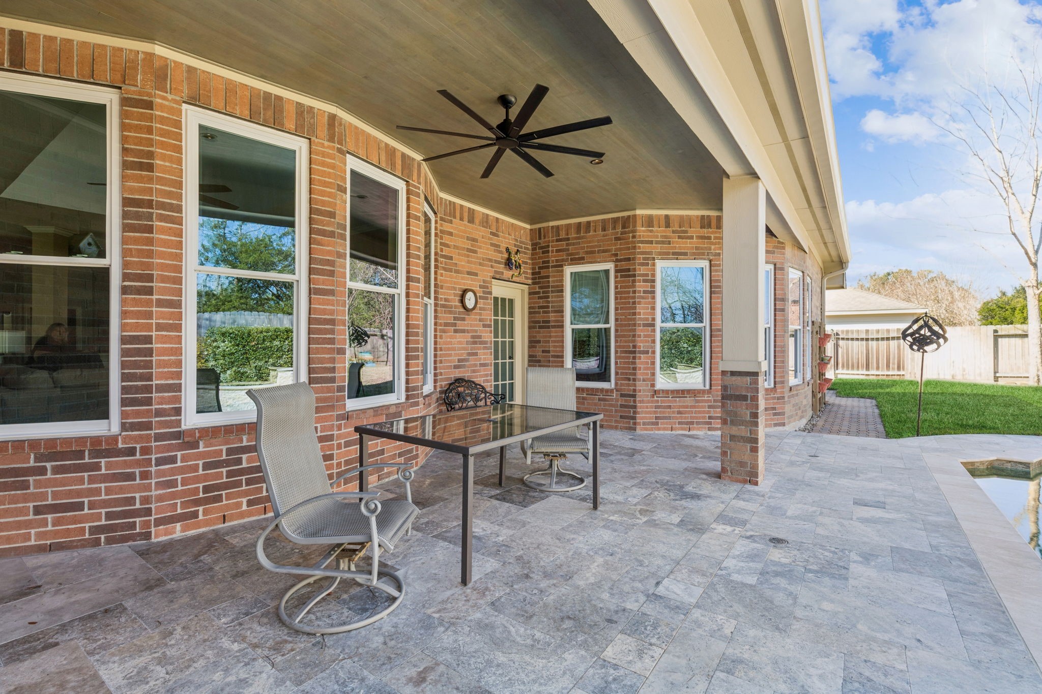 2809 Cedar Ridge Trail Friendswood, TX 77546 - Photo 30 of 33 GOOD VIEW OF TRAVERTINE TILE DECK AND SEALED OAK CEILING AT BACK PATIO