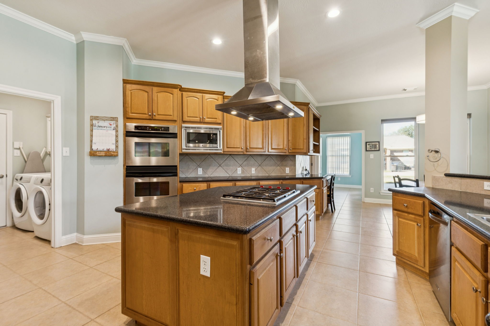 2809 Cedar Ridge Trail Friendswood, TX 77546 - Photo 10 of 33 VIEW OF ISLAND, SINK, AND WORKSPACE