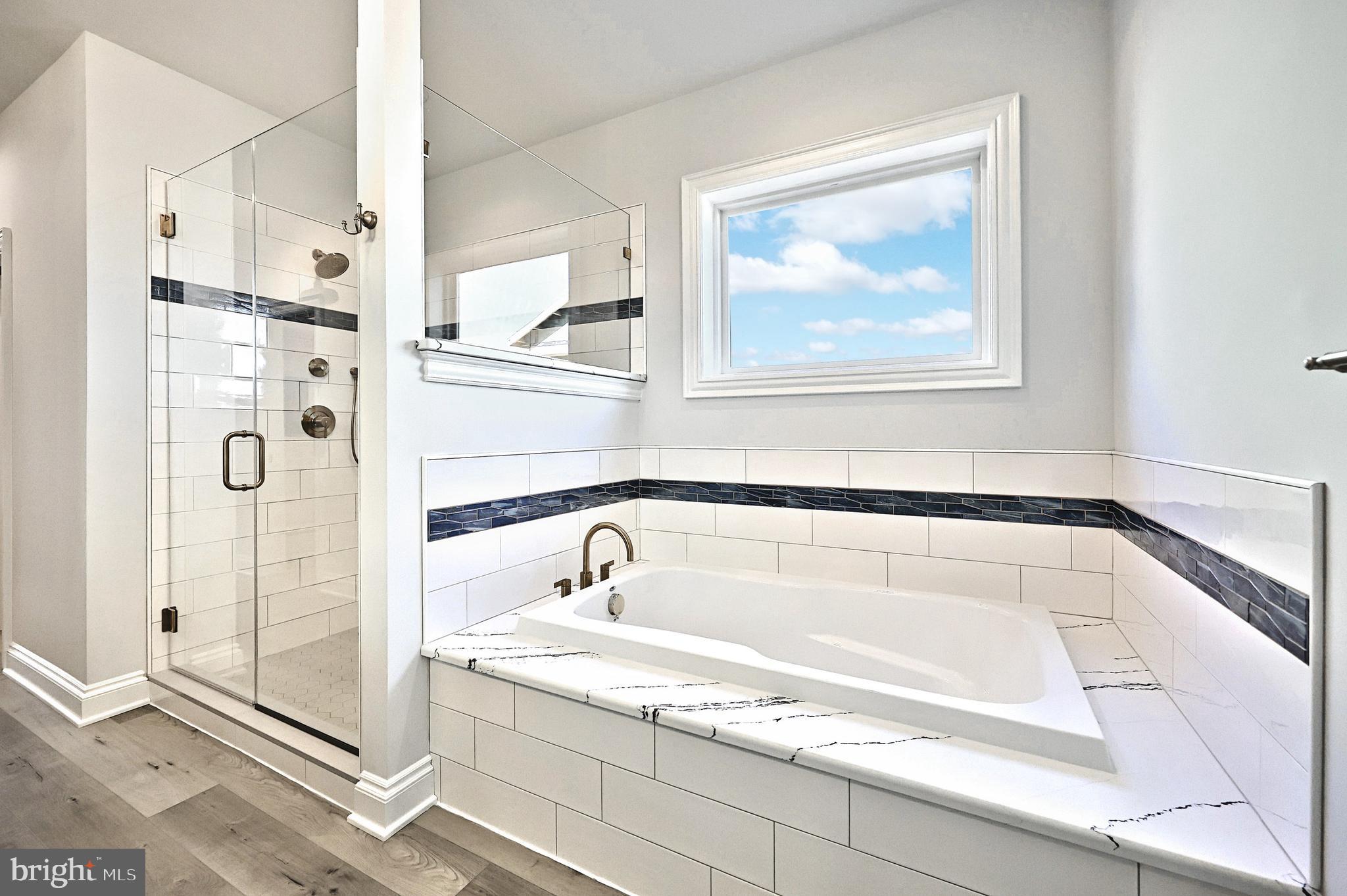 567 Lumber Street Littlestown, PA 17340 - Photo 29 of 62 a bathroom with a tub and a shower